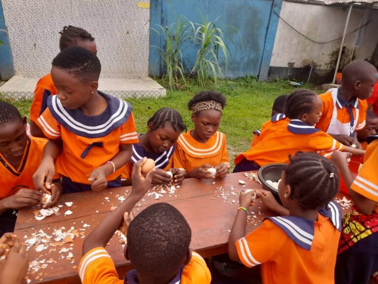 Pupils participating in a traditional craft activity